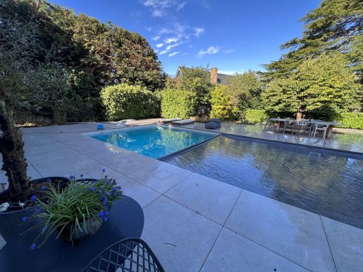 pool cover partially closed, outdoor pool