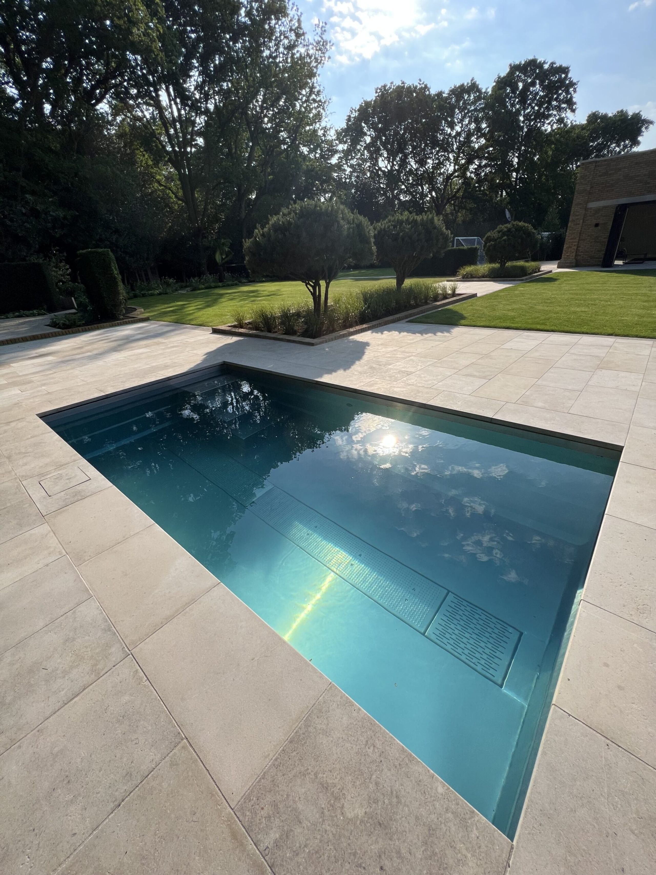 outdoor pool with cover open