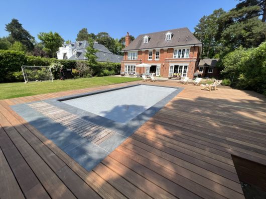 pool photo with house and cover closed