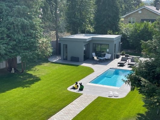 pool with cover pit in lawned garden